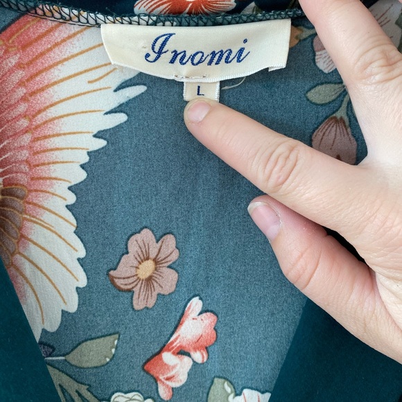 Crane print, emerald green flare leg jumpsuit with tie waist. Zips up side. - Picture 2 of 2